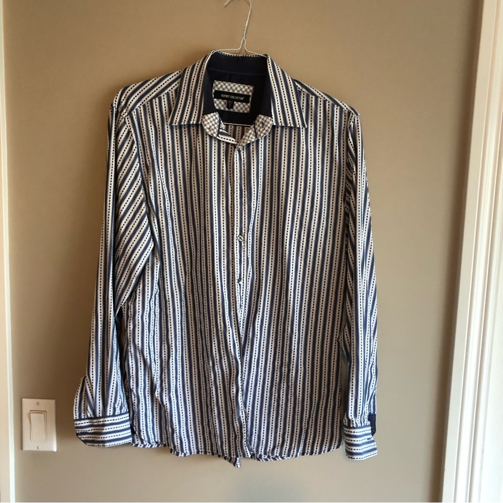 The perfect shirt to dress down or dress up with navy accent on the cuffs - XL